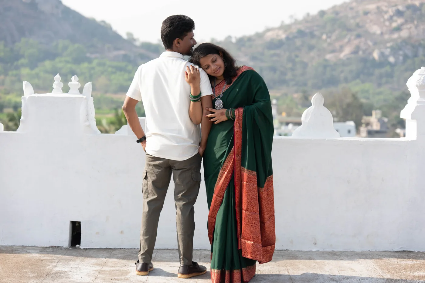 A couple photographed by Samarapix on a temple rooftop during their pre-wedding shoot