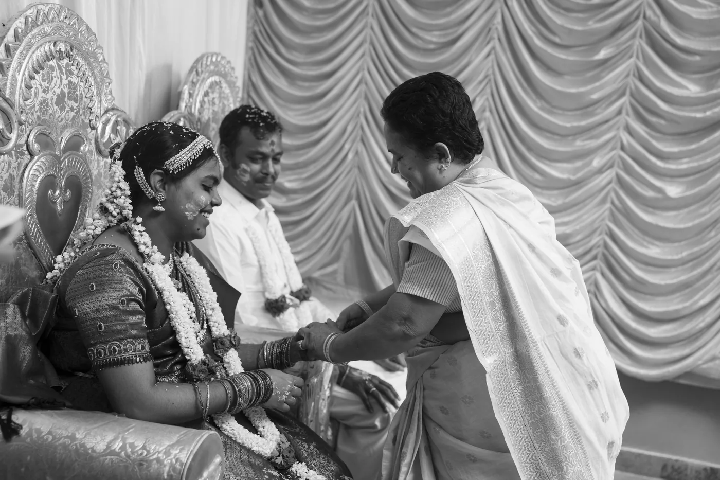 Black and white photograph of blessings at a baby shower