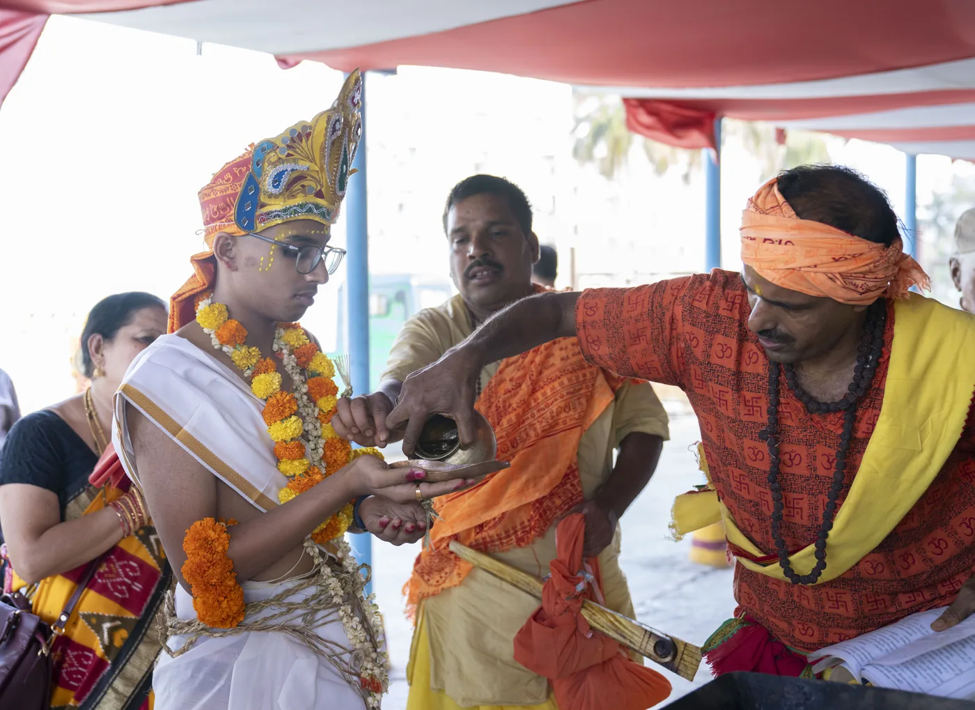 Upanayan ceremony moment photographed candidly outdoors
